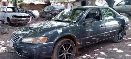 A picture of Toyota Camry envelope clean one with very clean interior engine