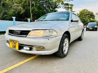 A picture of Carina Ti engine capacity 1490 Full file Price 6m Watsap