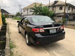 A picture of NEATLY USED 20 13 MODEL TOYOTA COROLLA Absolutely nothing to