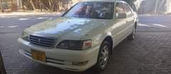 A picture of TOYOTA GX100 BEI MILLION 6 5