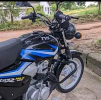 A picture of TVs 125 haina tatizo lolote full documents TSH 850 000