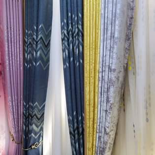 A picture of CURTAINS CARPETS