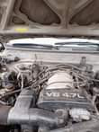 A picture of Nissan Frontier Auxilary gear Smoking Engine 900k owner 80k sambo