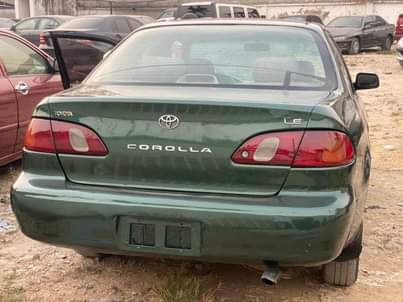 A picture of Extremely clean Toyota Corolla small but mighty With Sound Engine