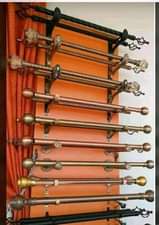 A picture of Curtains nets rods and other home decor items Whatsapp 0778140243