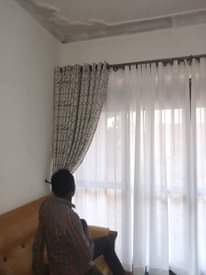 A picture of CURTAINS AND CURTAIN RODS
