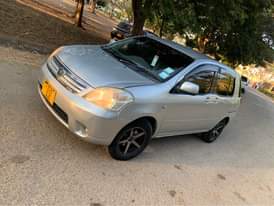 A picture of Toyota Raum 2007 Cc 1490 Mint condition Spot rims Android