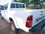 A picture of 2014 manual Toyota hilux with auxiliary gear in Abuja going