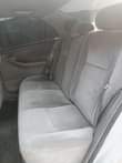 A picture of Toyota corolla 05 engine is taping but not smoking just