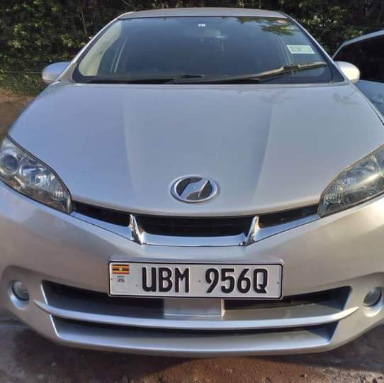 A picture of WISH 2011 7 Seater Black interior 0750147312. Nakasero Road near