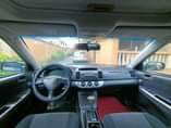 A picture of 2004 Toyota Camry 4plugs baked Clean in and out Engine