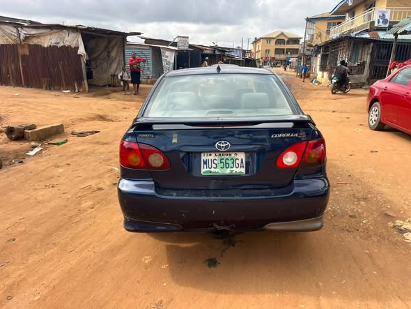 A picture of Toyota Corolla 2004 SE Register