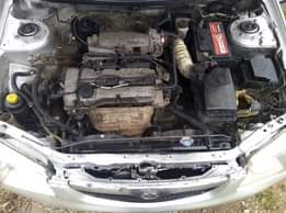 A picture of Mazda 323 4 sale Clean body and clean Interior Sound