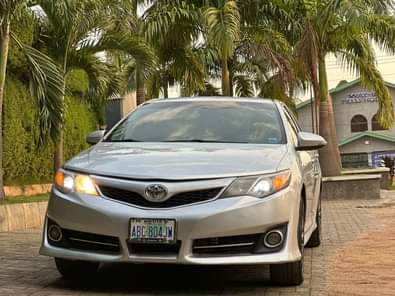 A picture of Mint 2014 Camry sport with untampered engine and follow come