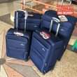 A picture of High quality suitcases available and free delivery kindly WhatsApp us