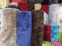 A picture of Fluffy center carpets in different colours and sizes