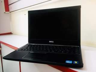 A picture of Dell Vostro V130 core i3 laptop with faulty battery needs