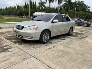 A picture of LIGHTLY USED TOYOTA COROLLA LE 2003 MODEL WITH DUTY LOCATION