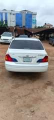 A picture of Super clean Toyota Avalon dashboard everything is working perfectly just