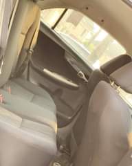 A picture of Brand TOYOTA Model Corolla Registered YEAR 2010 Color Black Price