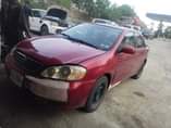A picture of A YEAR PLUS USED 2004 COROLA ENGINE GEAR AC OK