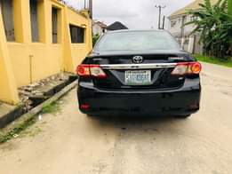 A picture of NEATLY USED 20 13 MODEL TOYOTA COROLLA Absolutely nothing to