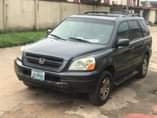 A picture of Up for Grabs 2004 Honda pilot Almost Toks Sharp as