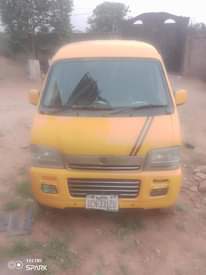A picture of Suzuki mini bus. Enugu color on first body. Mini direct