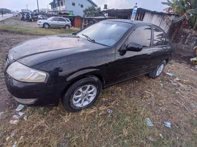 A picture of Neatly used nissan sunny 2008 AC Engine untouched Gear Bolt