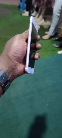 A picture of Quick sale Original Iphone 7 128gb Gold nice camera. Clean