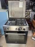 A picture of Nauza jiko la gas plate 3 gas moja umeme oven