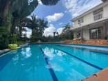 A picture of House for sale in Kitende_Entebbe road with a swimming pool