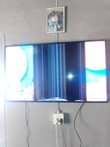 A picture of We fix broken electronic devices Tvs microwave plasma washing machine