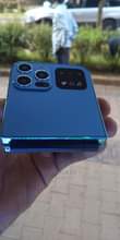 A picture of NEW APPLE LOG BUTTON PHONE WITH TRIPPLE CAMERA APPLE LOG