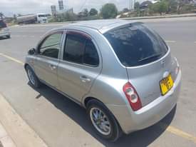 A picture of Nissan march new model nzuri mno full Ac matairi mpyaaa