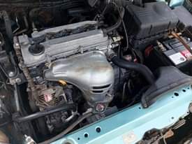 A picture of Toyota Camry first body pan motor engine and gear ac
