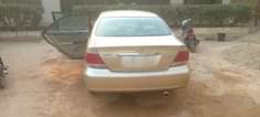 A picture of 2005 camry buy and drive with a c chilling nothing