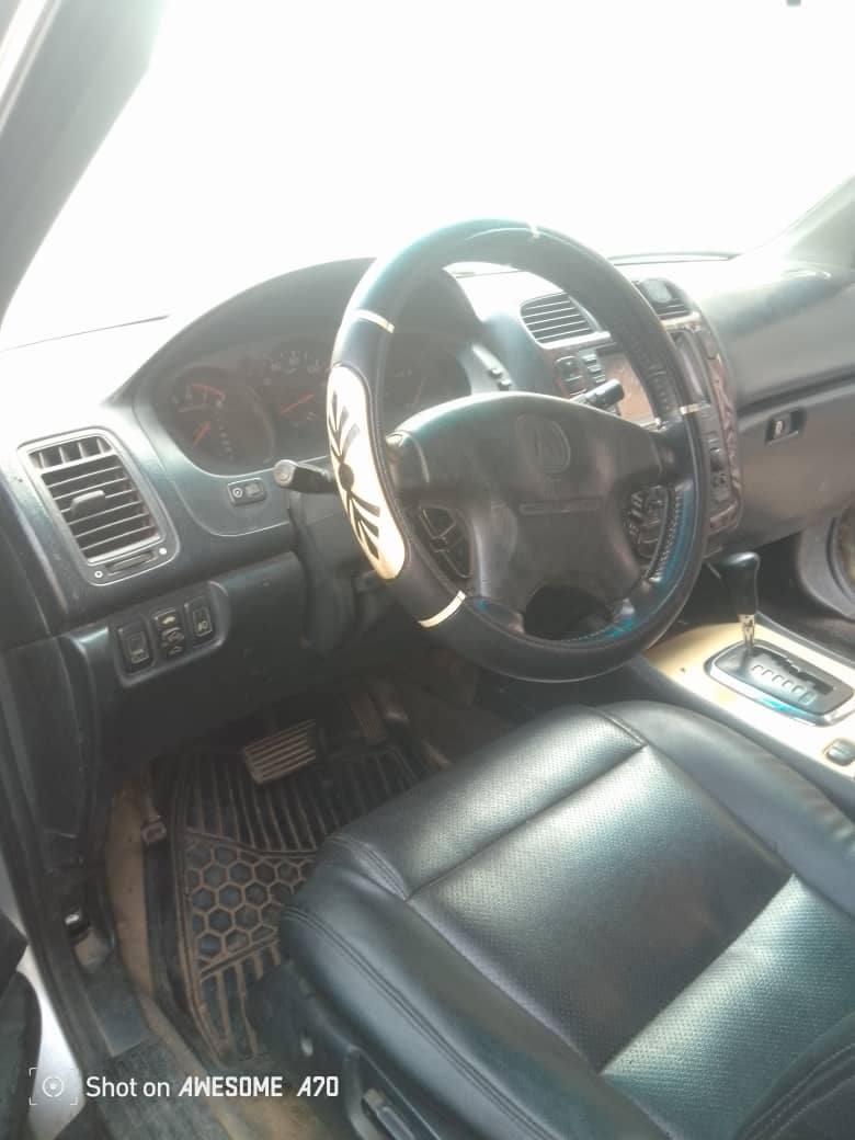 A picture of Acura mdx buy and drive location Ijegun Lagos call or