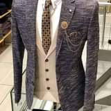 A picture of Men en women suits in all FASHIONZ WhatsApp me on