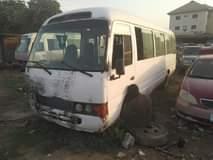 A picture of Toyota coaster bus Needs little body works Engine is good