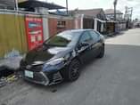 A picture of NIGERIAN USED TOYOTA COROLLA 2014 FACELIFTED TO 2018 PARTLY PAINTED