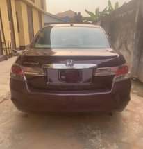 A picture of Clean Nigerian Used Wine Honda Accord 2010 Repainted Leather interior