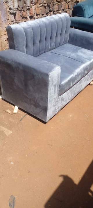 A picture of 2 seater sofa seat in grey colour available 0740734173