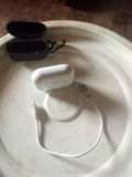 A picture of Am selling this airpod with charger