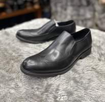 A picture of Great men s shoe s whatsapp 256704920917