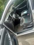 A picture of 2004 Toyota Corolla LE Super Sharp Engine with working AC