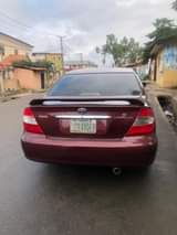 A picture of Toyota Camry 2004 4 plug Engine Gear and AC is