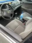 A picture of Toyota Camry 2004 First body but some parts painted Uber
