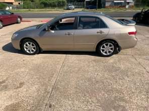 A picture of Full option Well maintained Clean gold color Honda accord With