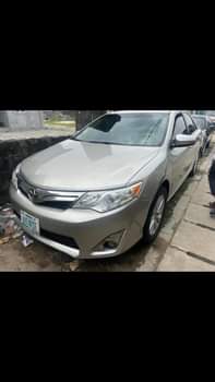 A picture of Toyota Camry 2014 015 model everything working perfectly okay Engine